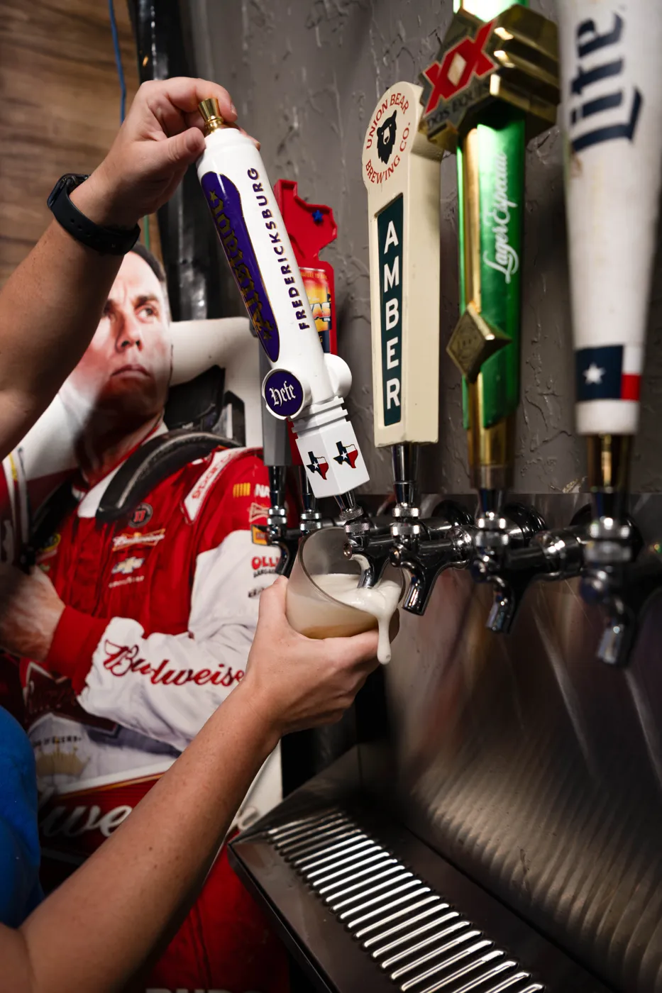 Draft beer being poured from the taps at Backstreet